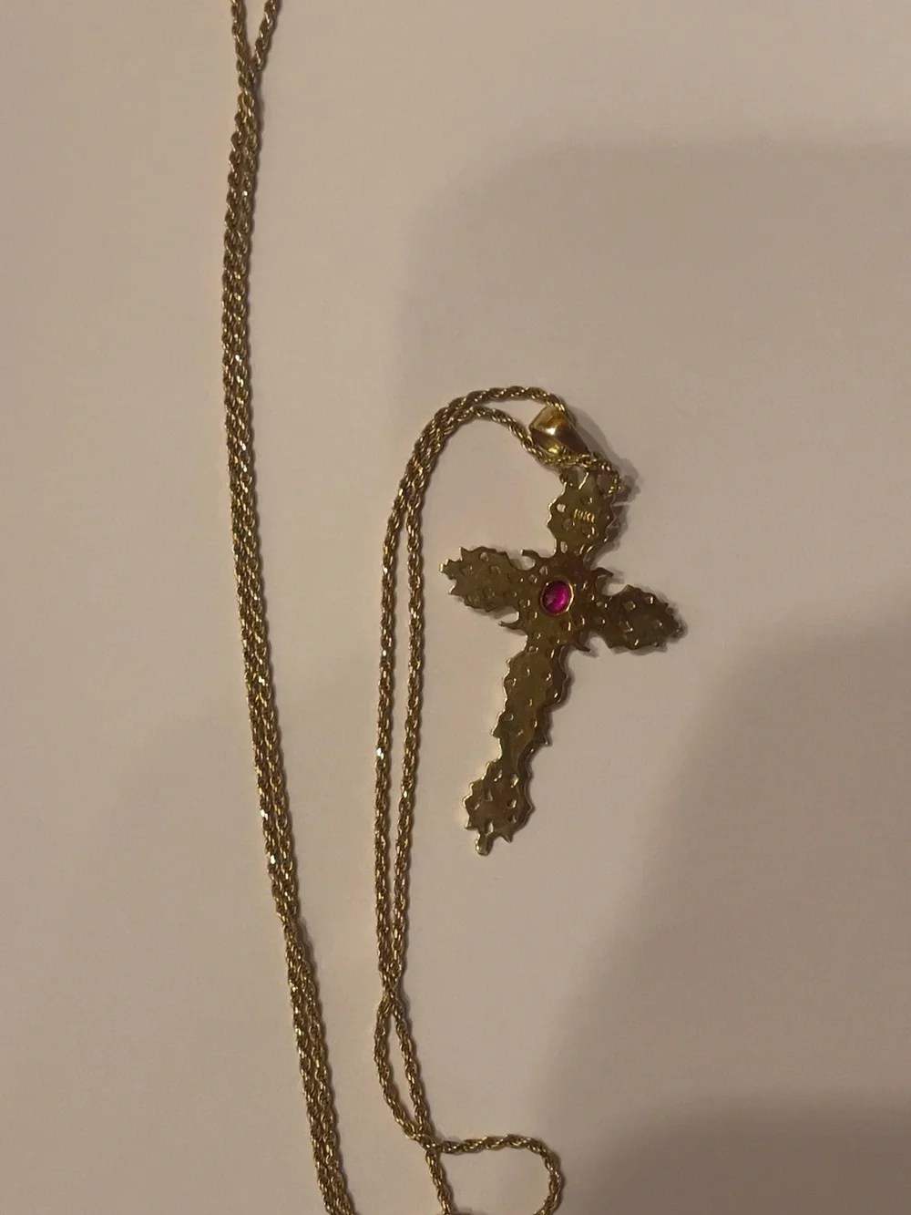 18 karat chain with a cross pendant